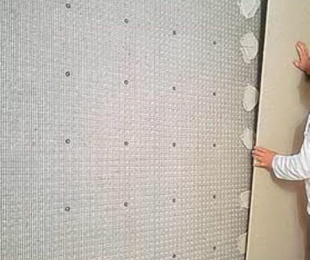 Cómo pegarse el panel de yeso en la pared